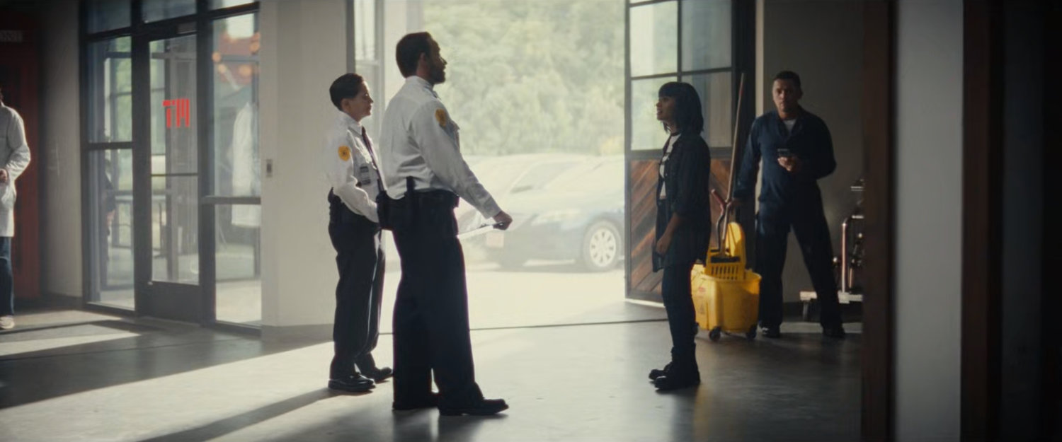 Security guards by door to an MIT laboratory.