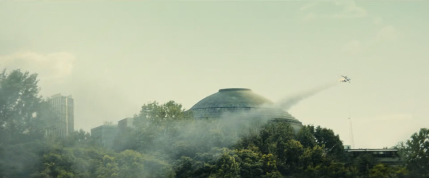 Ironheart flying past the MIT Great Dome.