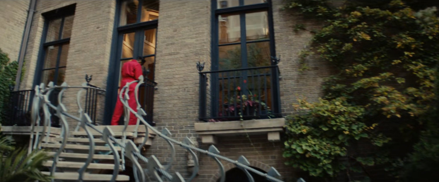 Clown at the back door of a Chicago mansion.
