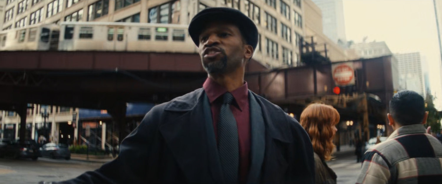A man proselytizing on a Chicago street corner.