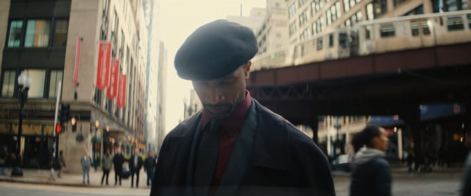 A man proselytizing on a Chicago street corner.