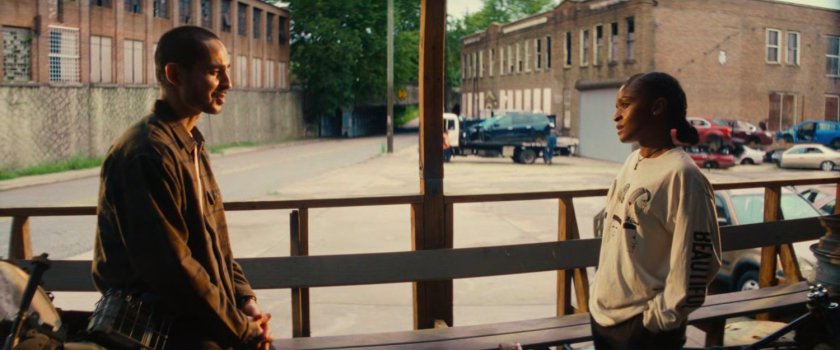 John and Riri on the front porch of Jim's Junkyard.