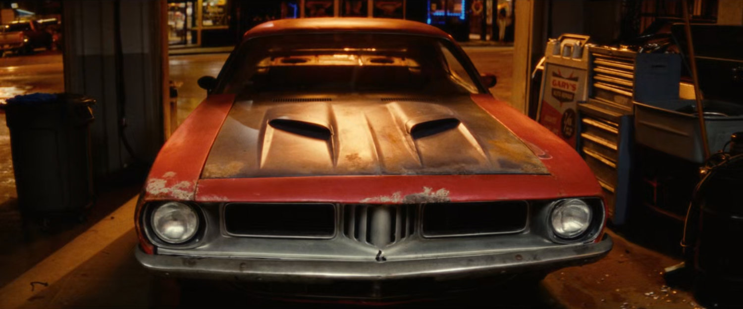 A classic car inside Gary's Auto Repair.