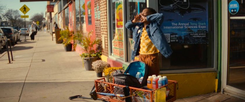 Landon selling drinks on a sidewalk in Chicago.