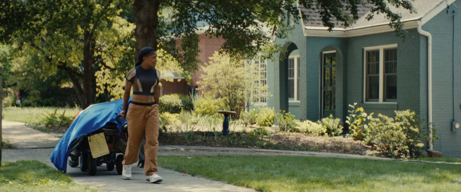 Riri pulling wagon with the Ironheart armor.