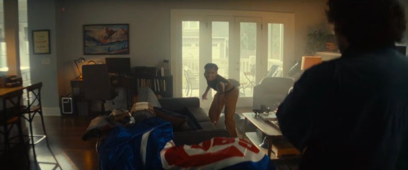 Riri and Joe in his living room.