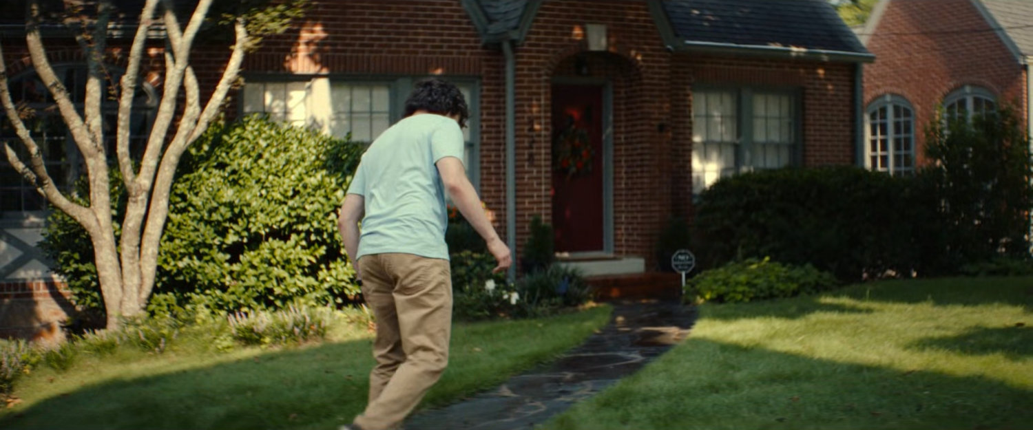 Joe outside his house.