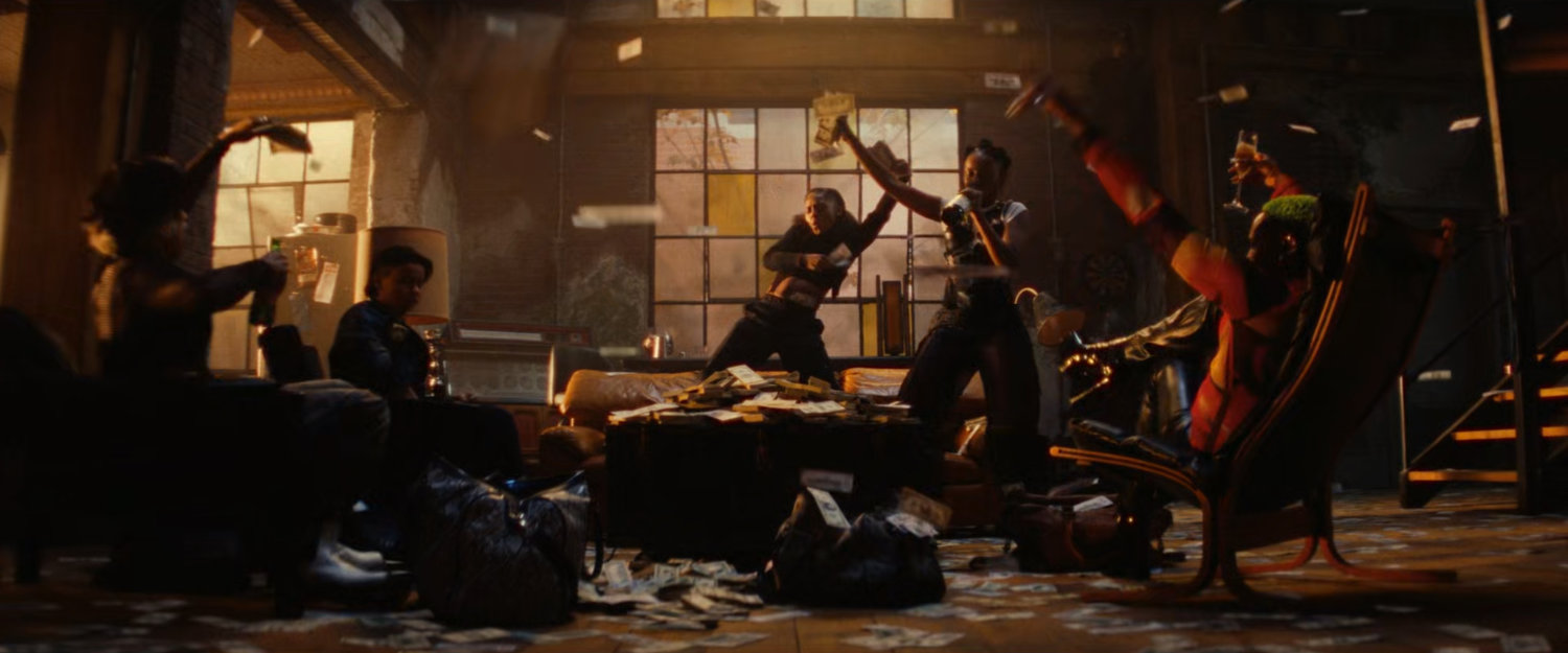 The Hood's crew celebrating by flinging money around.