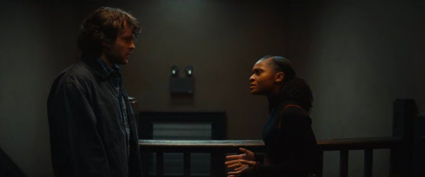 Joe and Riri in the hallway outside her apartment.