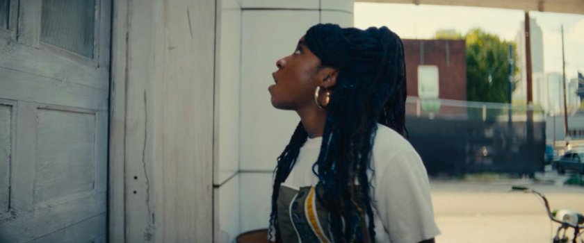 NATALIE outside Gary's Auto Repair.