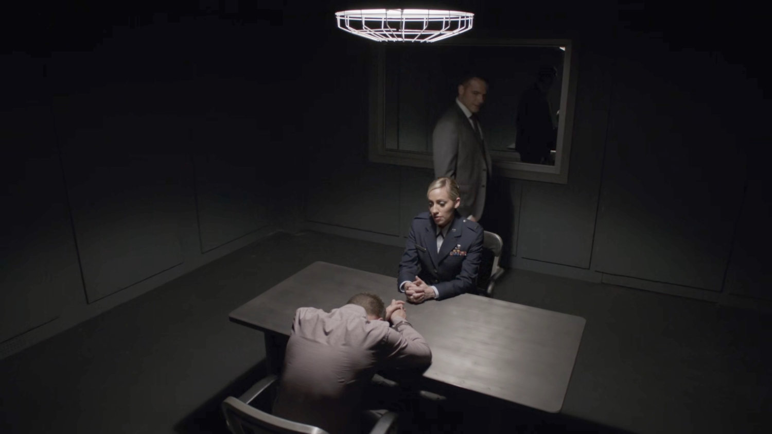 Lt Lucas and Lt Evans interrogate Fitz at a military base.