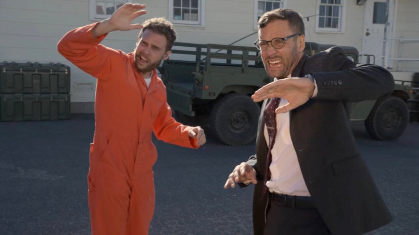 Hunter and Fitz running on a military base.
