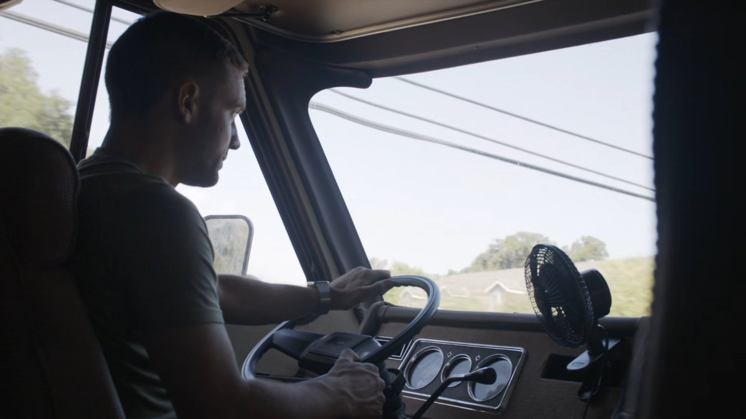 Hunter driving a motor home.