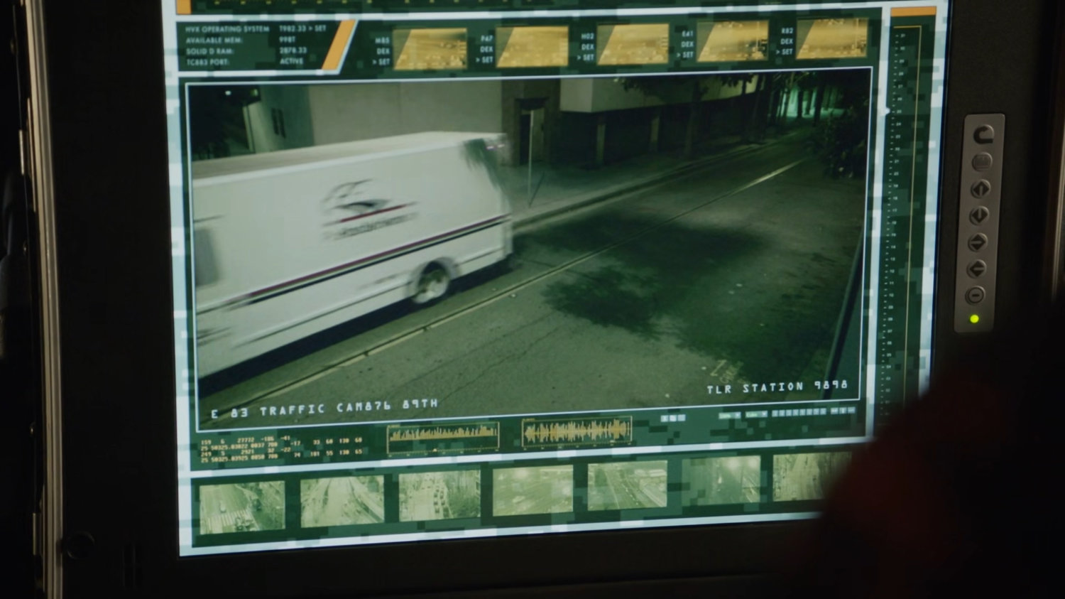 Surveillance video of a mail truck.