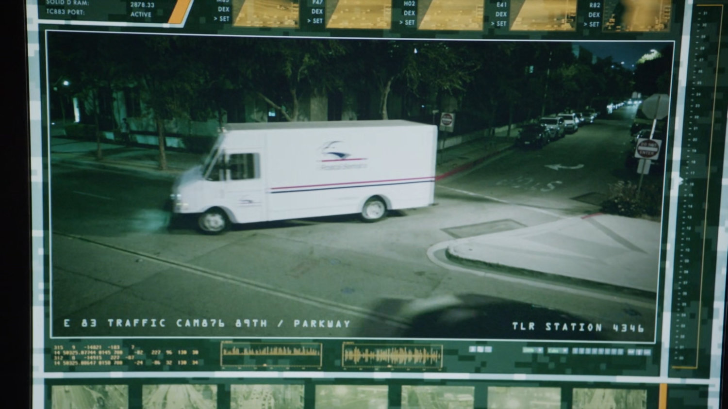 Surveillance video of a mail truck.