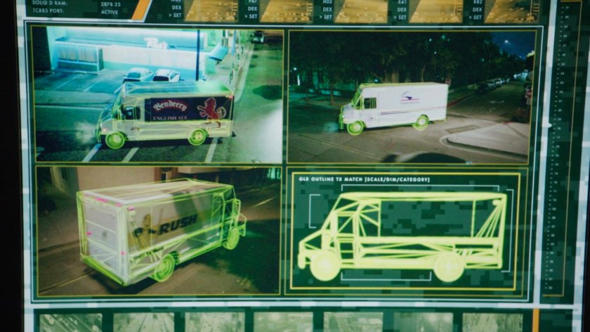Grid of multiple surveillance videos of trucks.