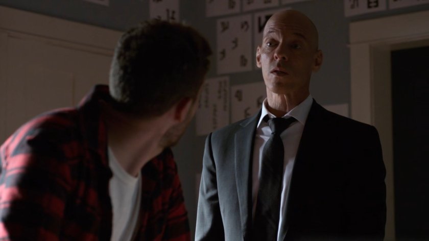 Fitz, and Enoch in his living room.