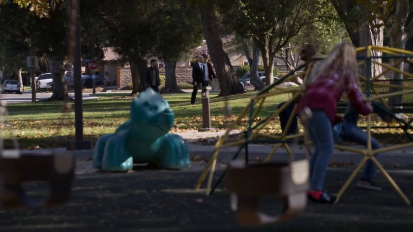 Hunter, Fitz, and Enoch walking through a park.