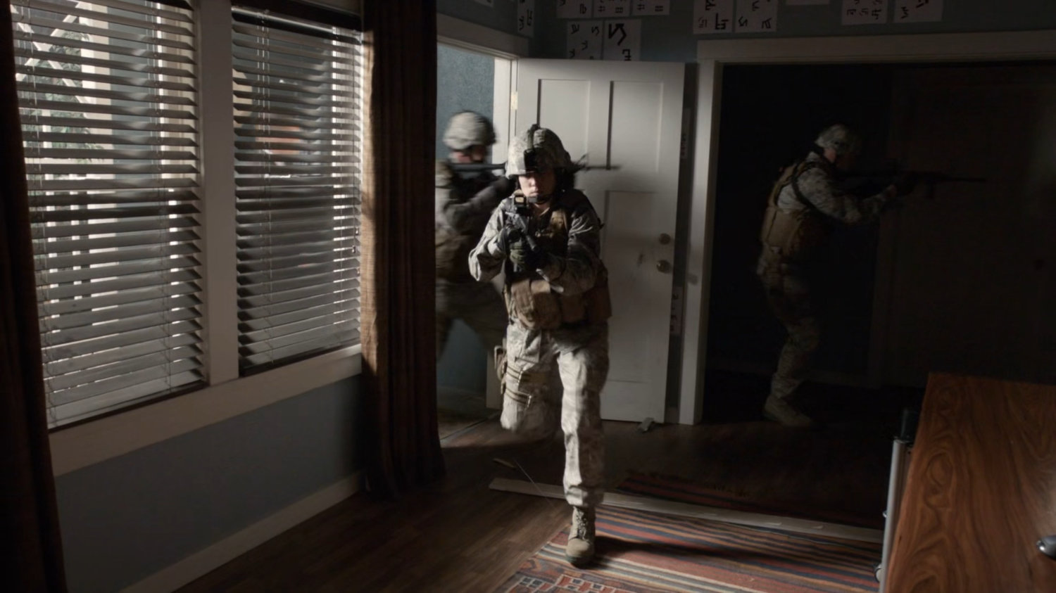Military team breaks into Enoch's house.
