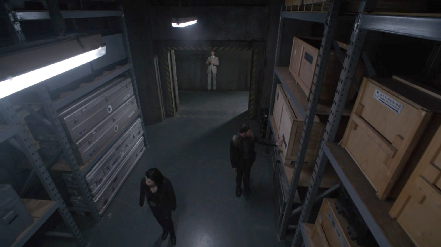 May and Fitz investigate a storage room in the Lighthouse.