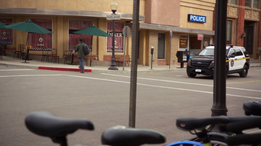 A police vehicle outside the station in River's End.