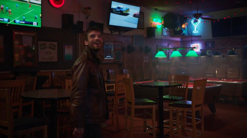 Deke in a bar in River's End.