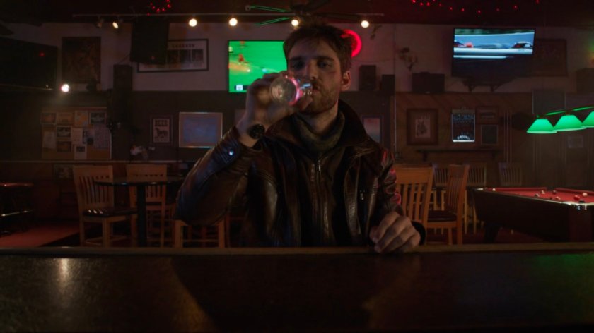 Deke in a bar in River's End.