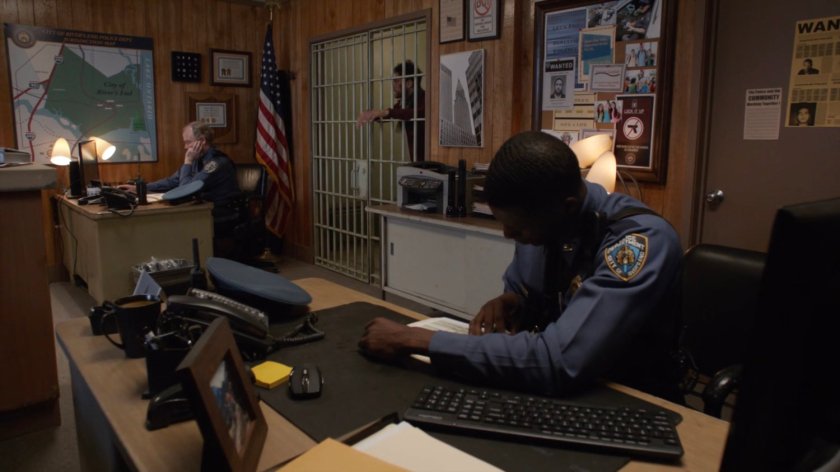 The sheriff and deputy inside the River's End police station.