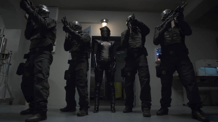 Ruby and her goons inside an aerospace lab in St Louis.