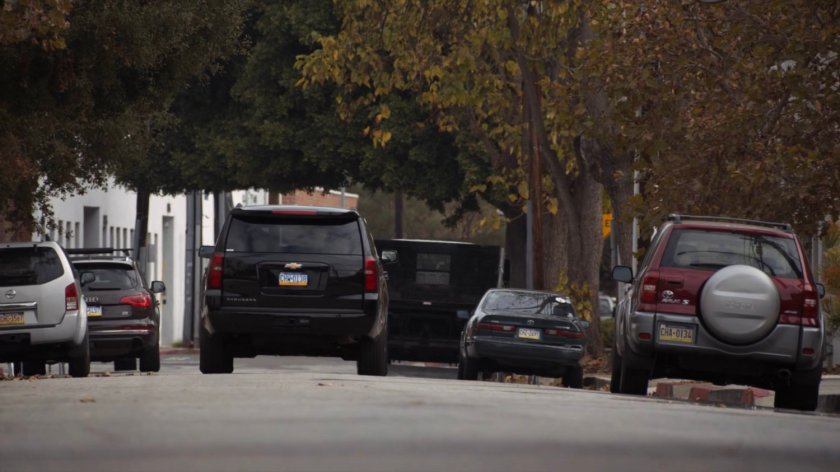 General Hale's SUV drives along a Philadelphia street.
