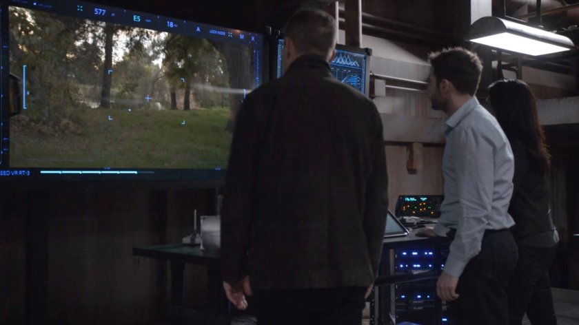 Coulson and Fitz watching a video of a forest on Level 27 from the command room of The Lighthouse.