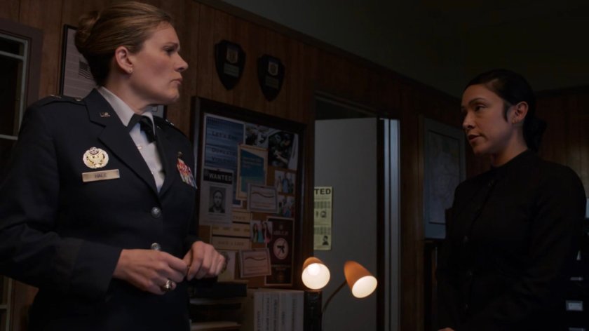 General Hale and her aide in the police station of River's End.