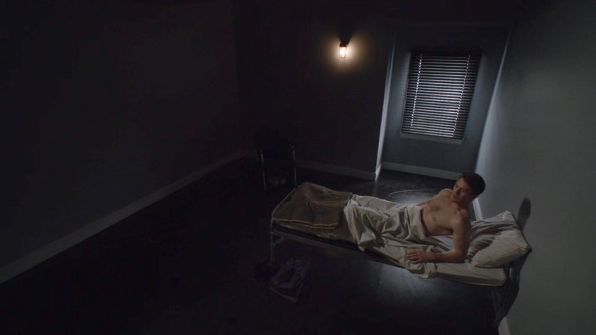 Alex Braun in a sparse bedroom in General Hale's Base.