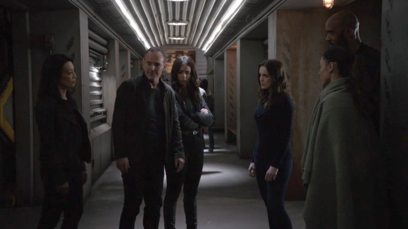 The Agents in a hallway of The Lighthouse.