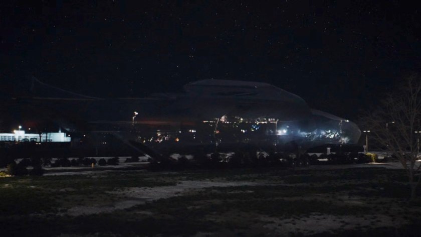 Cloaked Zephyr One on a road at night.