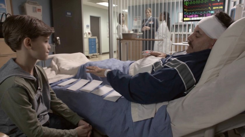 Talbot and his son in a hospital room, with his wife and General Hale speaking to Doctor Ford outside.