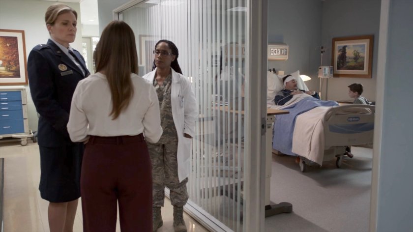 Talbot and his son in a hospital room, with his wife and General Hale speaking to Doctor Ford outside.