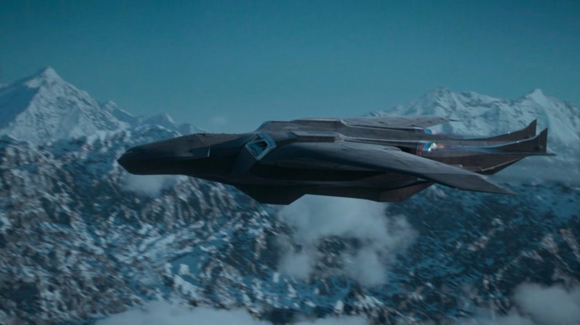 Zephyr One flying over snowy mountains.