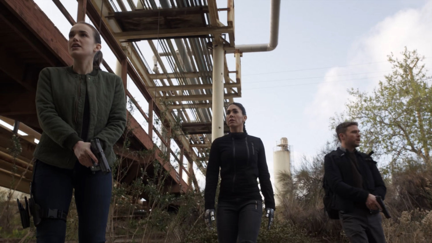 Simmons, Fitz, and Yo-Yo by a bridge at a HYDRA R&D site in Herefordshire.