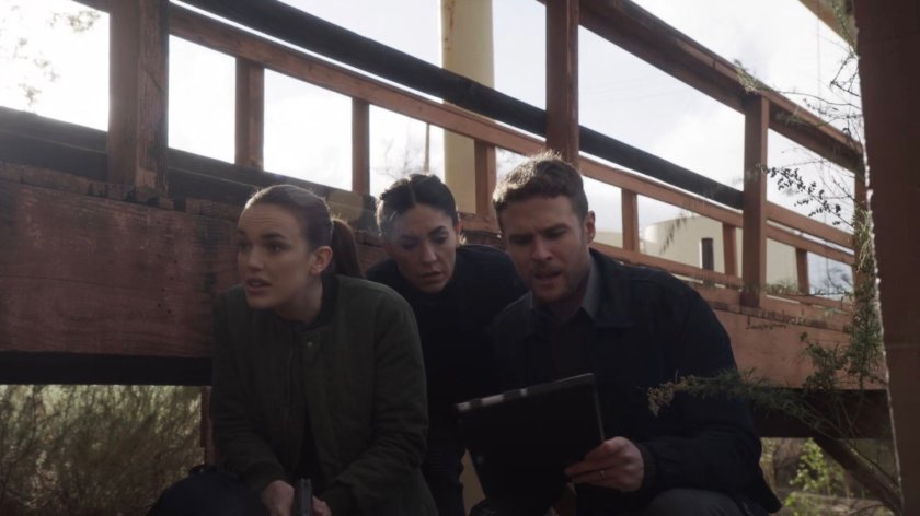 Simmons, Fitz, and Yo-Yo by a bridge at a HYDRA R&D site in Hereforshire.