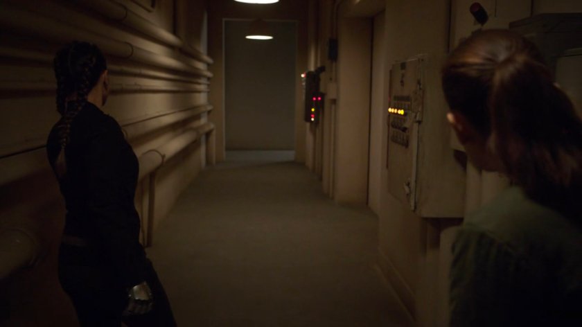 Simmons and Yo-Yo in a hallway of of a HYDRA R&D site in Hereforshire.