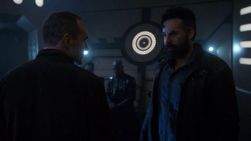 Coulson and Talbot on Qovas's space ship.