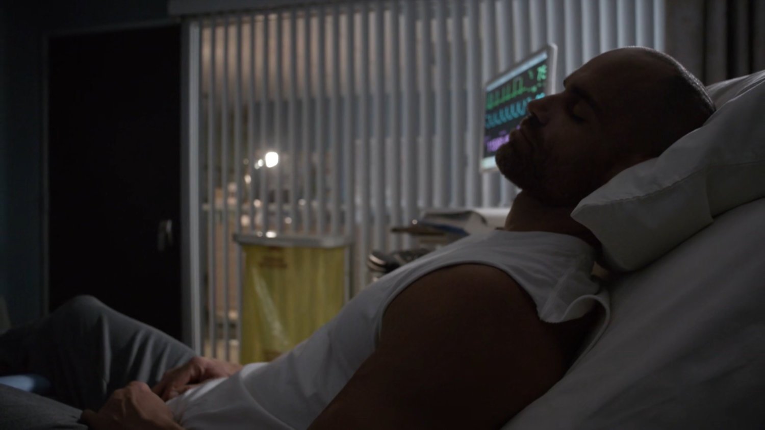 Carl Creel in a hospital room.
