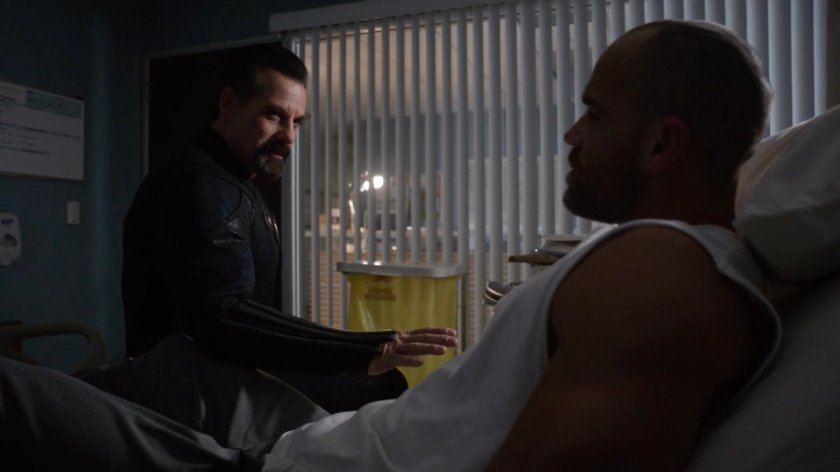 Talbot and Carl Creel in a hospital room.