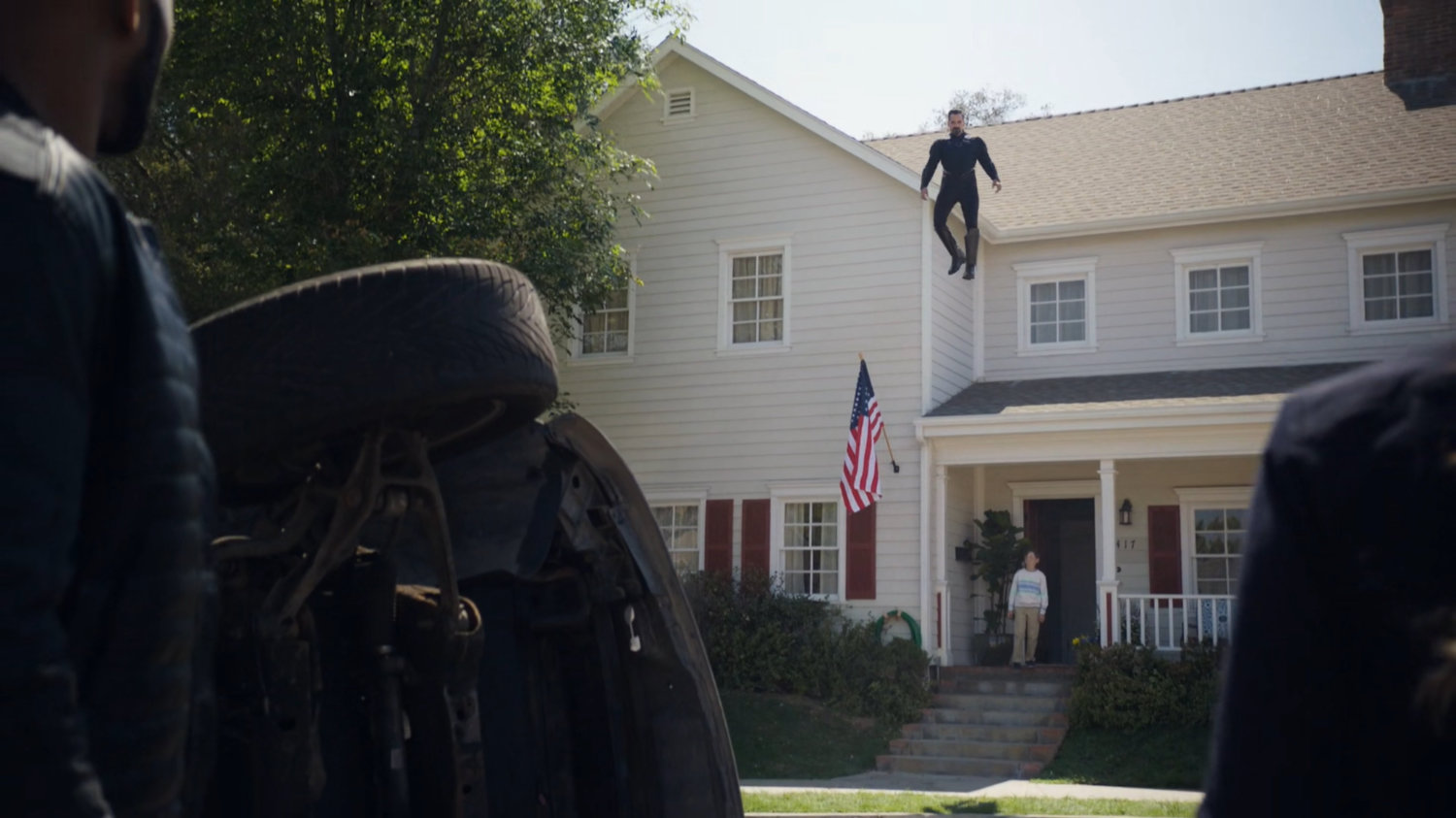Glenn Talbot flies above his house.