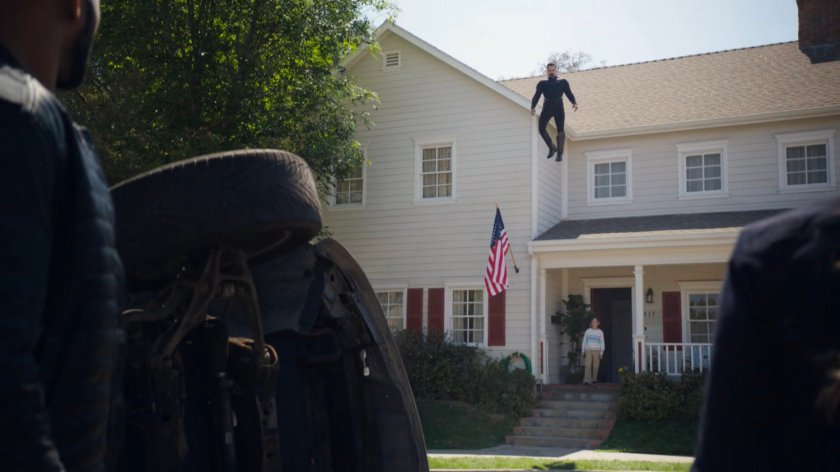 Glenn Talbot flies above his house.