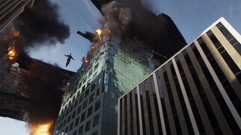 Glenn Talbot hovers through the wreckage of Chicago skyscrapers.