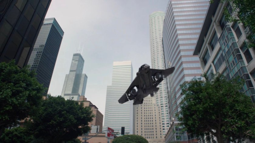 A quinjet coming in for landing on a Chicago street.