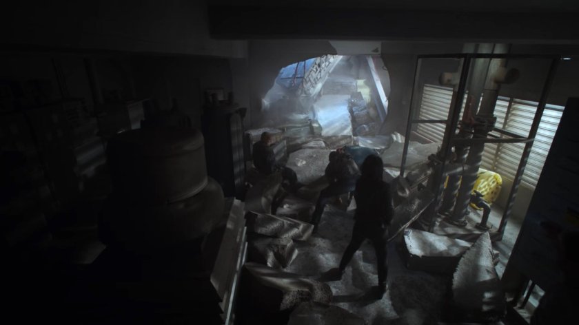 Fitz, Mack, and May in a debris strewn room of a Chicago high rise.