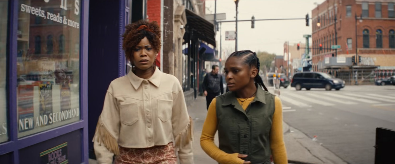 Ronnie and Riri on the sidewalk outside Stanton's Sweets Reads & More.